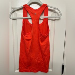 Lululemon swiftly tech tank. Red/orange color. Size 4.